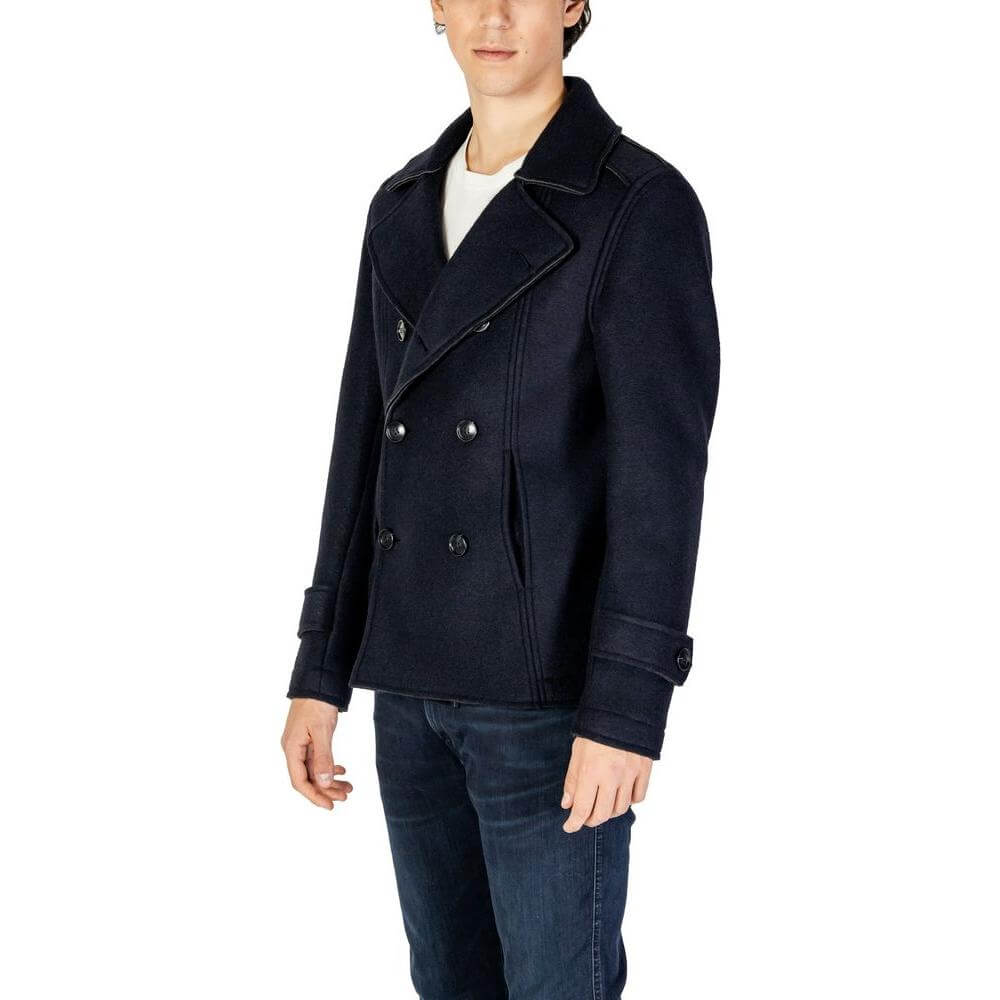 Man wearing Hydra Clothing blue viscose jacket, fall/winter collection, with double-breasted design, polyester and wool blend.
