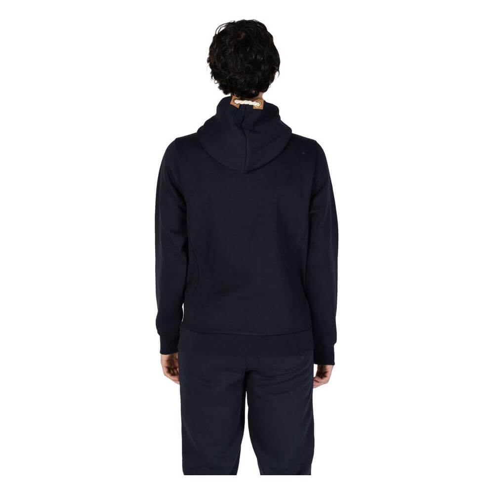 Back view of a man wearing Hydra Clothing blue cotton sweater, part of men's fall/winter collection, made from 60% cotton and 40% polyester.