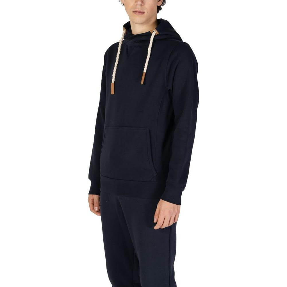 Man wearing Hydra Clothing blue cotton sweater, ideal for fall and winter. Features: 60% cotton, 40% polyester blend.