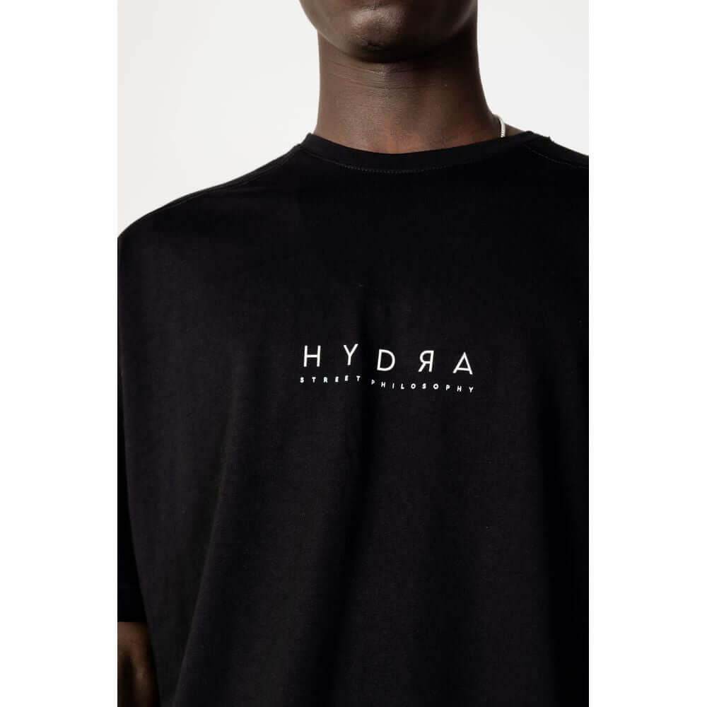 Hydra Clothing black cotton sweatsuit for men, spring/summer collection, featuring logo on chest, 100% cotton material.