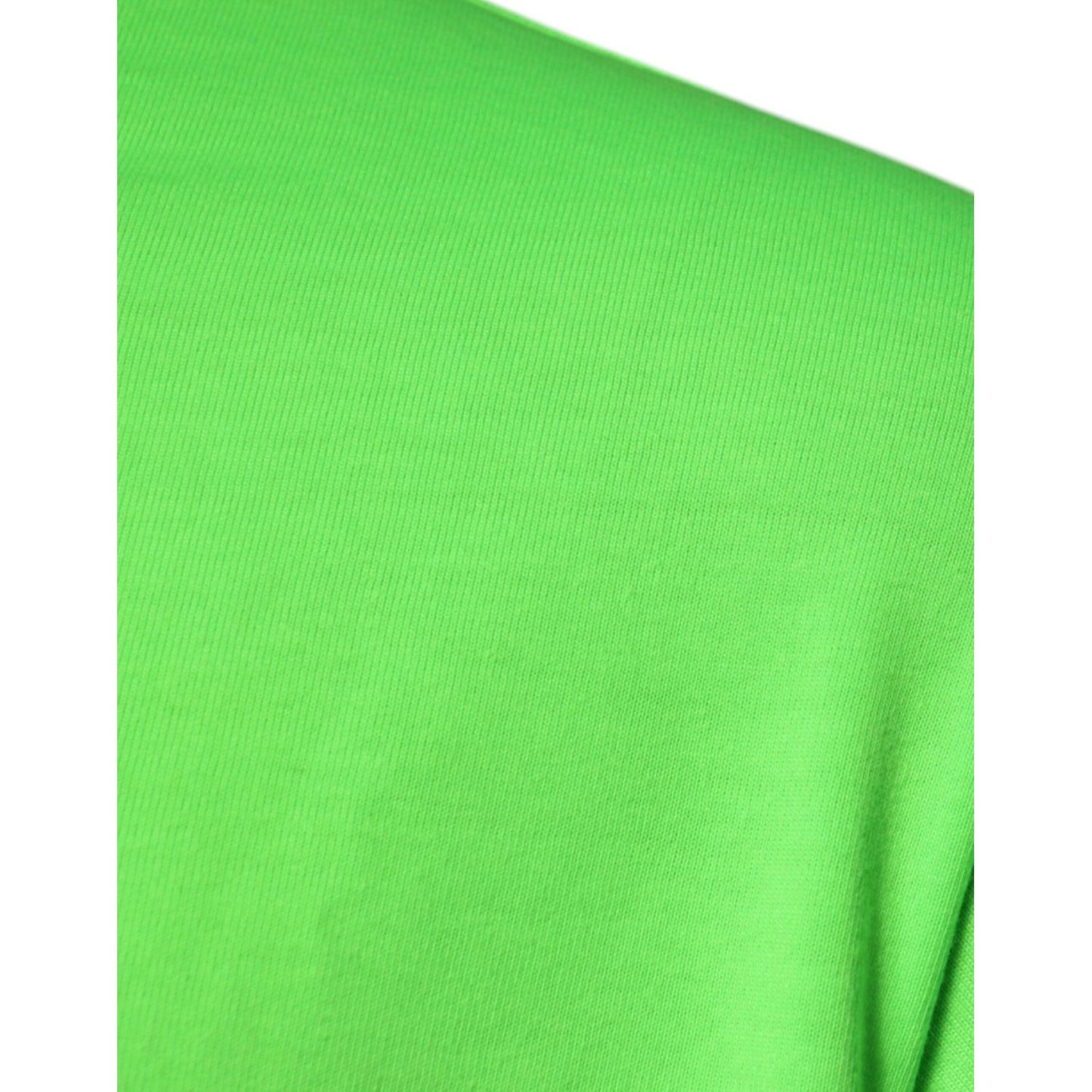 Close-up of Dolce & Gabbana neon green polyester crew neck t-shirt fabric, showcasing its vibrant color and texture.