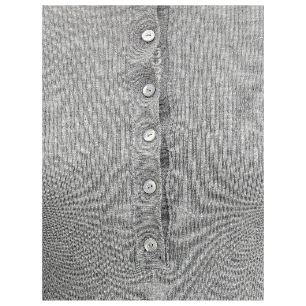 Gucci Cashmere Polo Sweater with ribbed design and tone-on-tone buttons, showcasing elegant craftsmanship and iconic style details.