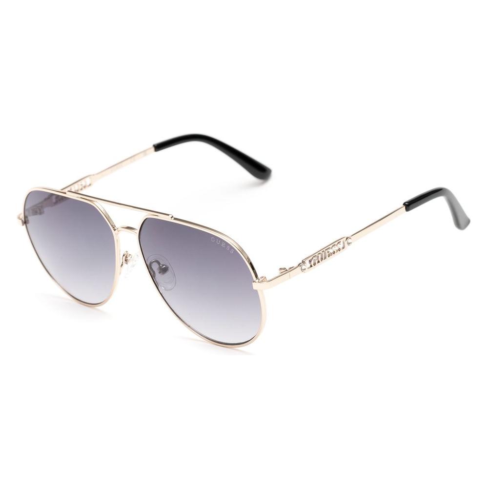 Guess women's gold metal sunglasses with grey lenses, style GF6195-5632B, featuring a 56/12/140 mm frame size.