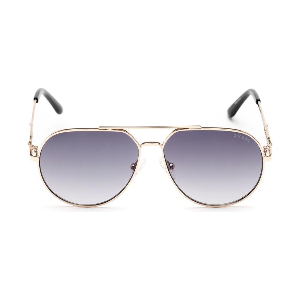 Alt Tag: Guess gold metal sunglasses for women with grey lenses, model GF6195-5632B, featuring a 56/12/140 mm frame.