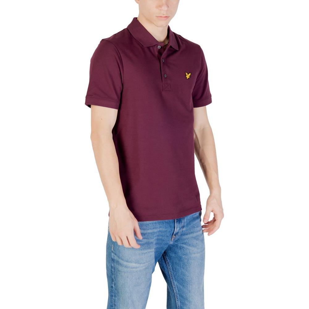 Lyle & Scott Bordeaux cotton polo shirt for men, featuring logo, paired with jeans for a casual look. Versatile summer wardrobe essential.