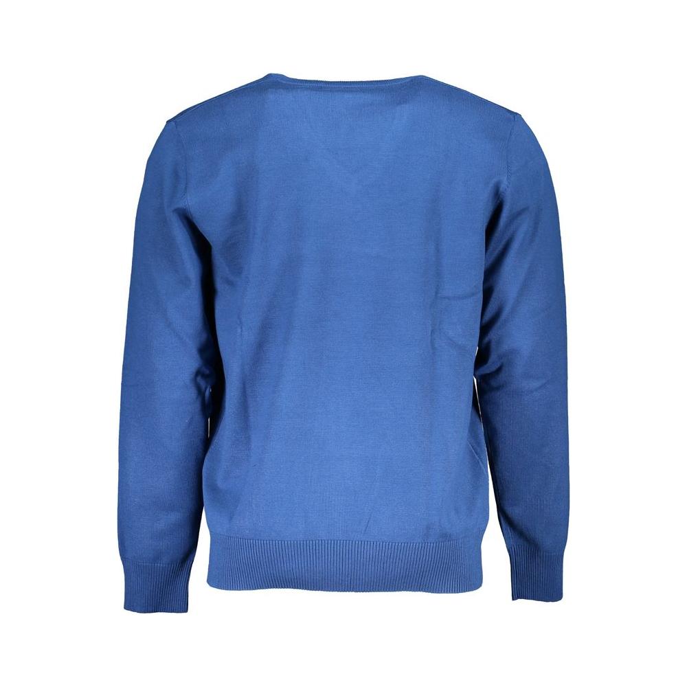 Back view of U.S. Grand Polo blue nylon sweater with long sleeves and V-neck design.