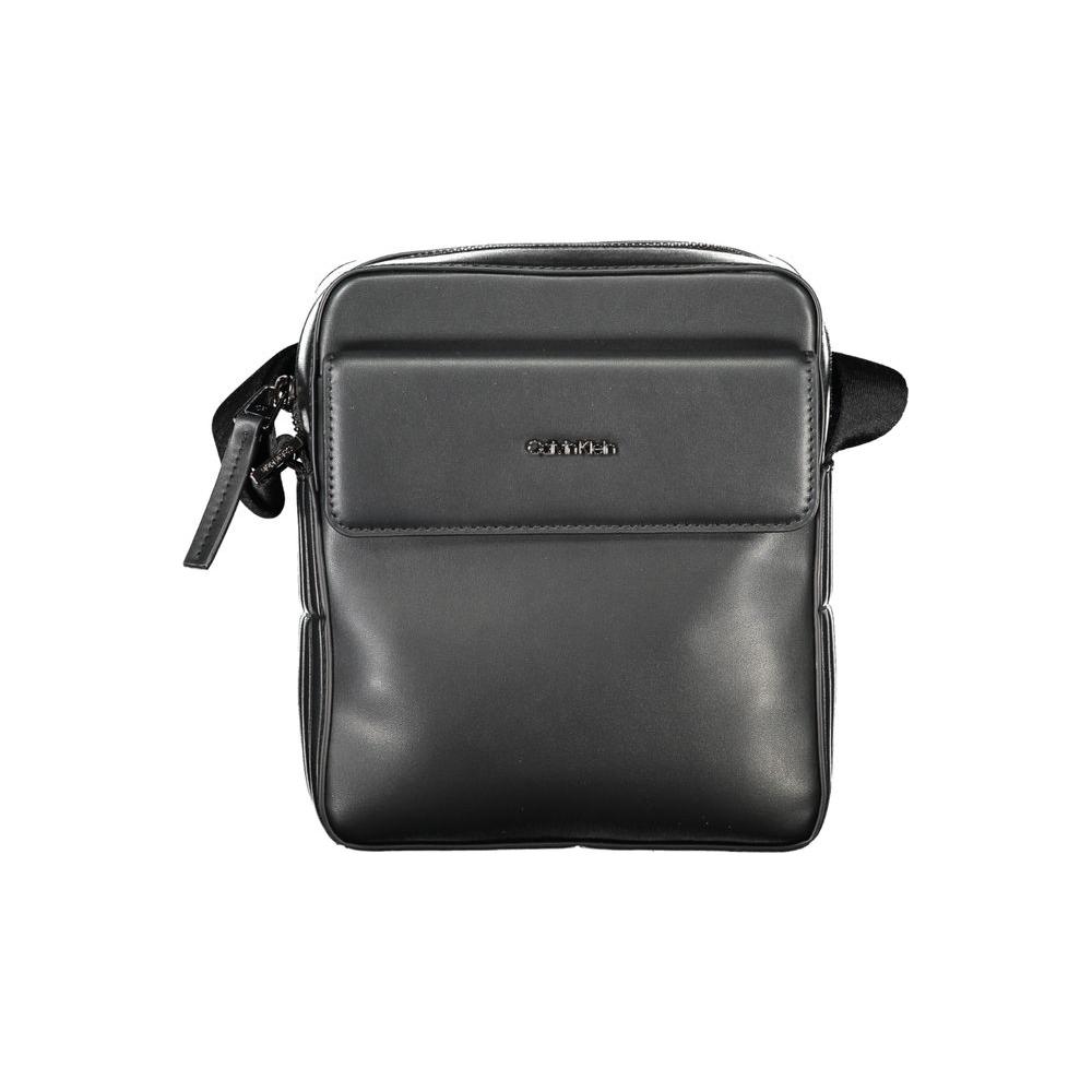 Calvin Klein black polyester men's shoulder bag with secure zip and magnet closures, featuring a sleek and modern design for urban style.