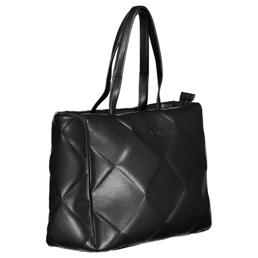 Calvin Klein black handbag with quilted design, two shoulder handles, internal pocket, zip closure, and logo, made of recycled polyester.