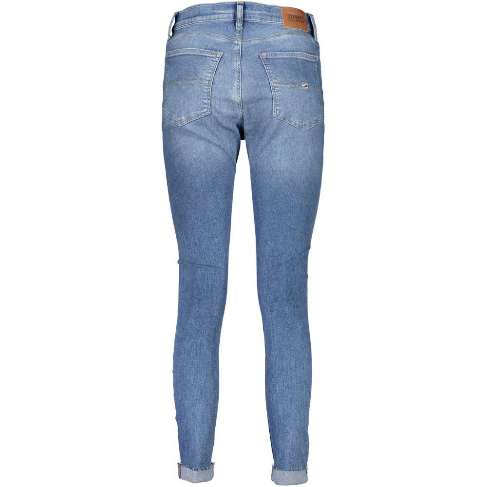 Tommy Hilfiger women's light blue skinny jeans, back view, featuring classic stitching and logo patch on waist.