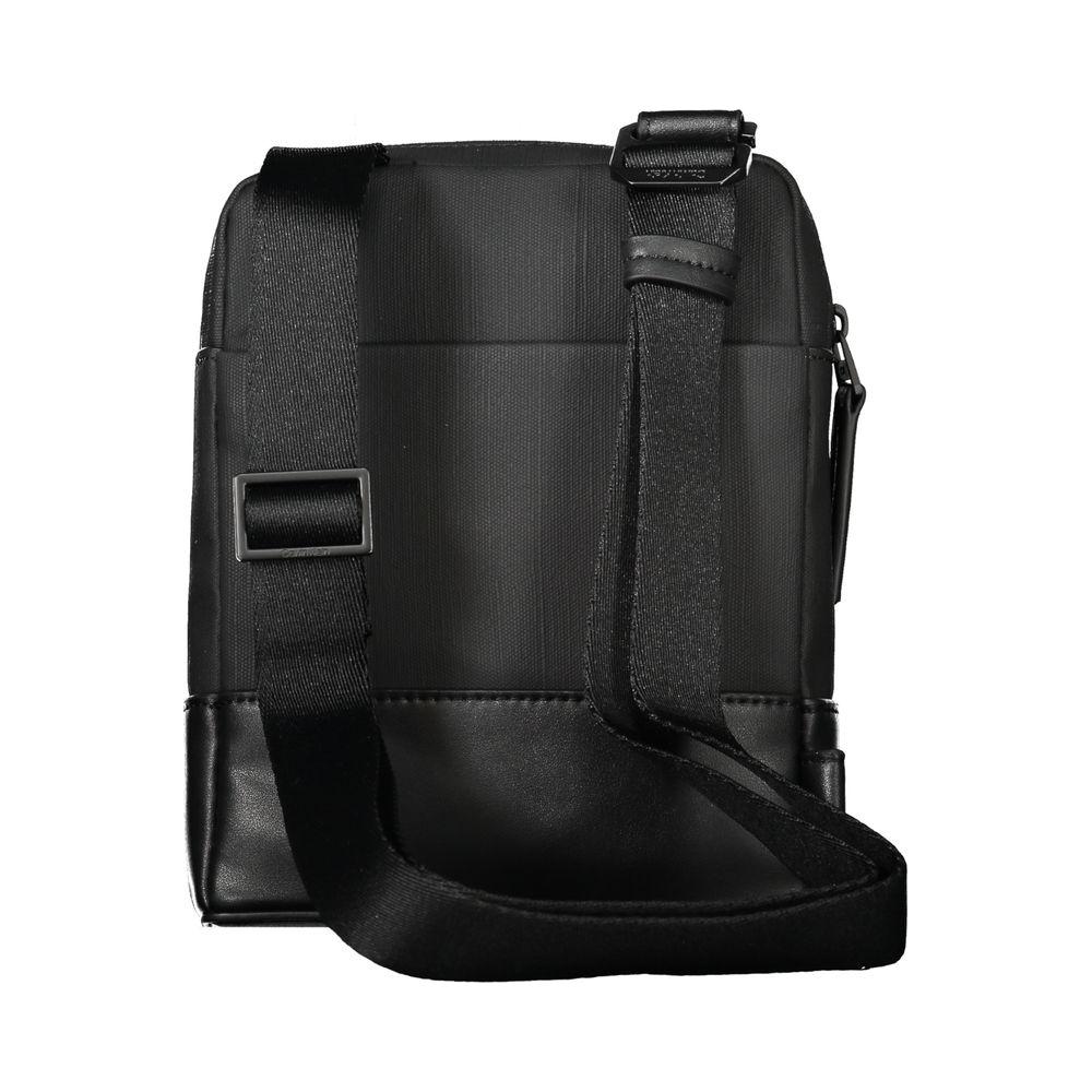 Calvin Klein black polyester men's shoulder bag with adjustable strap, featuring sleek design and secure zip closure for modern practicality.