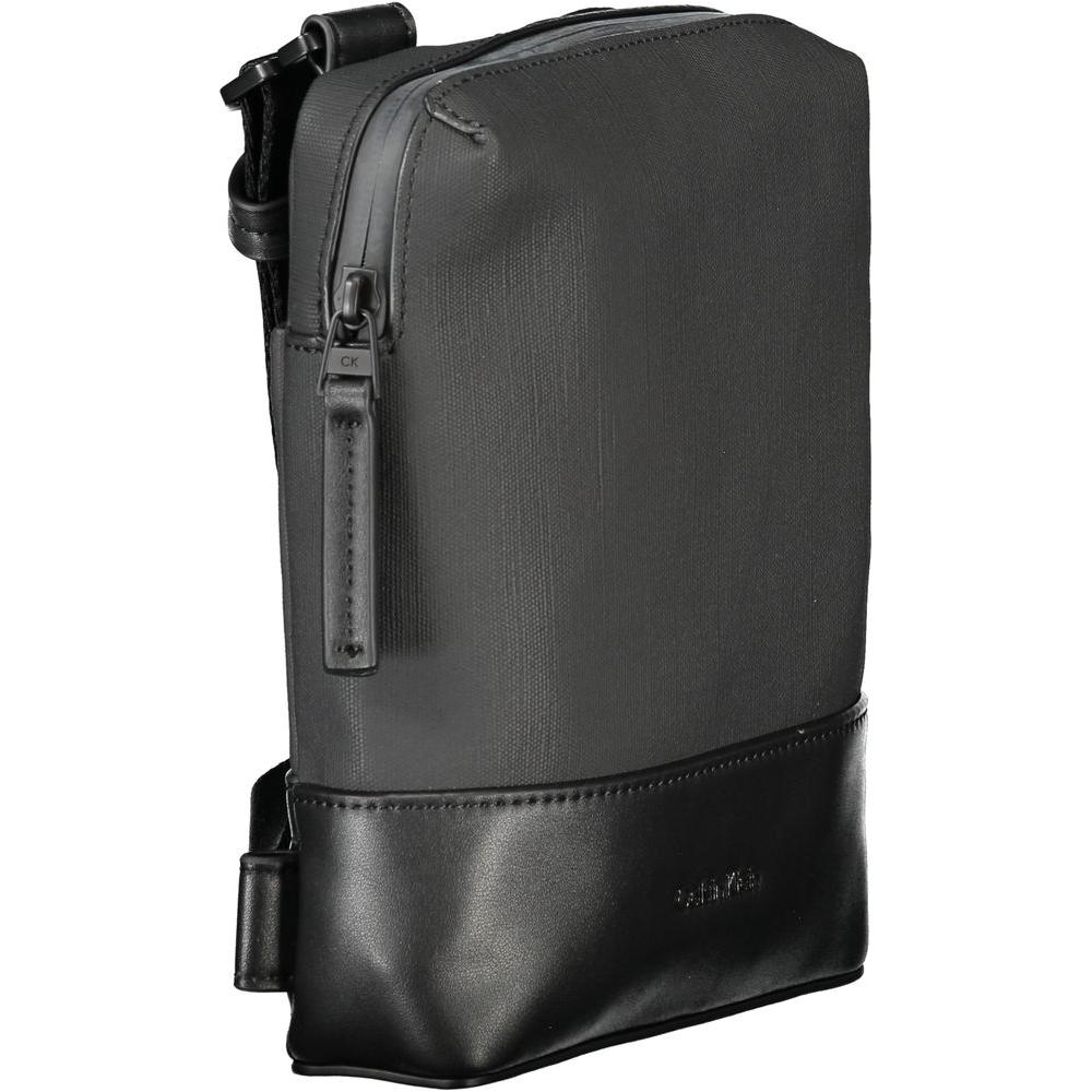 Calvin Klein black polyester men's shoulder bag with zip closure and logo, ideal for modern style and organization.