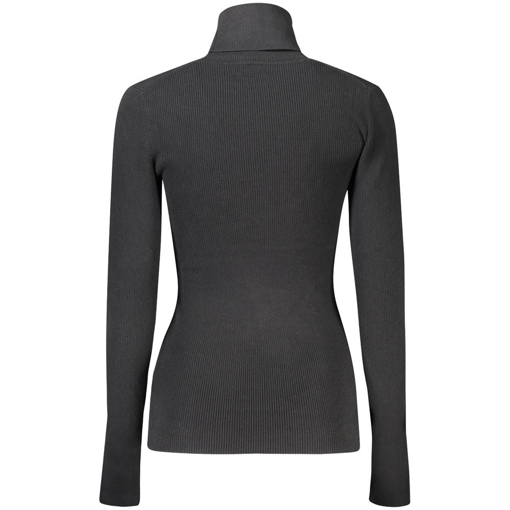 Calvin Klein black cotton women’s turtleneck sweater, long sleeves, back view showcasing sleek and modern style, fashion-forward design.