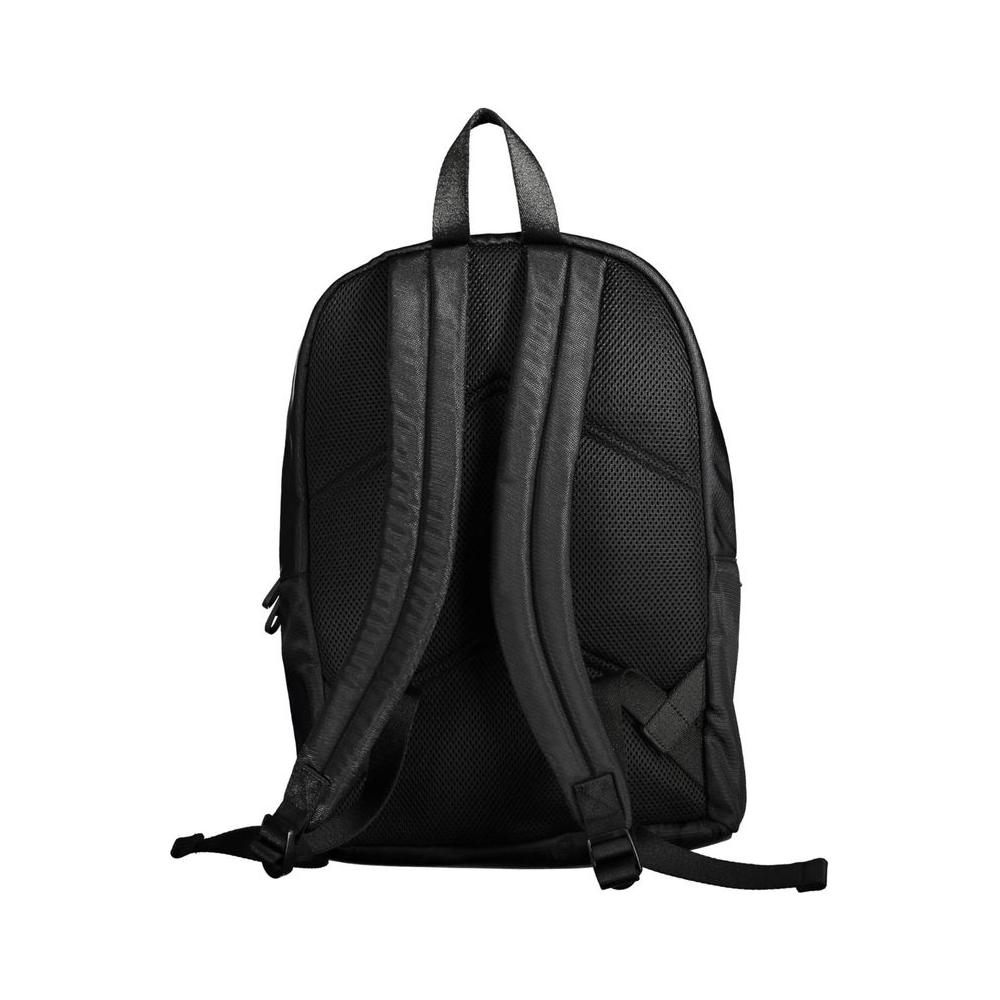 Back view of Calvin Klein black polyester men's backpack with adjustable straps and sleek urban design.