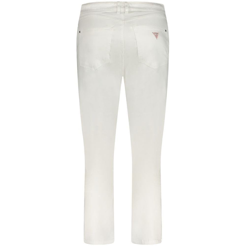 Back view of Guess Jeans white lyocell women’s jeans with five-pocket design and logo detailing, showcasing stretchy skinny fit fashion.