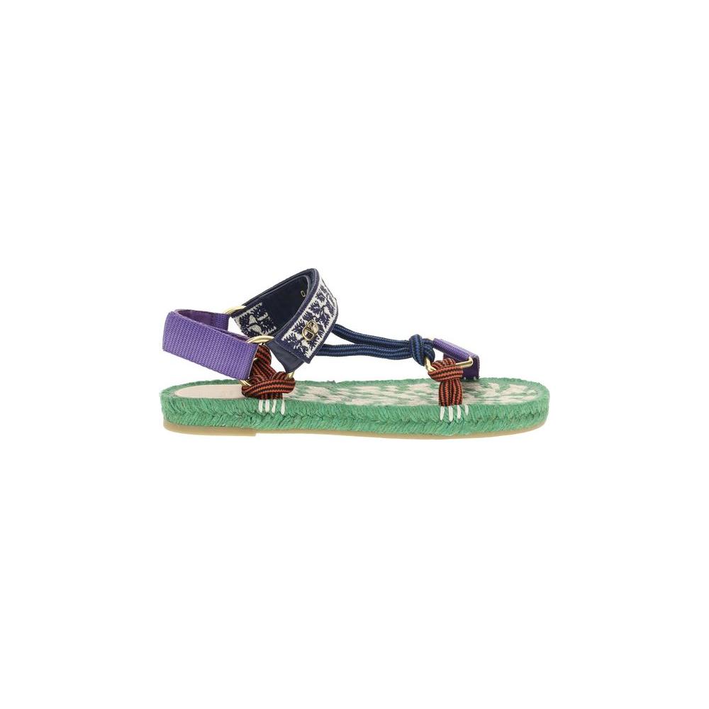 Valentino Garavani Lake Powell Sandals with a round toe, flat rope sole, and signature metallic VLogo on adjustable Velcro straps.