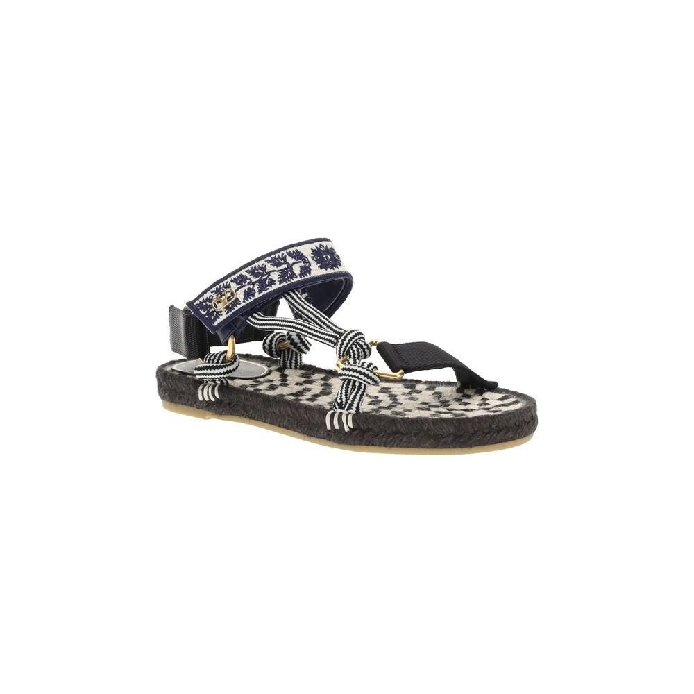 Valentino Garavani Lake Powell Sandal with rope sole, double Velcro strap, and metallic VLogo on front.