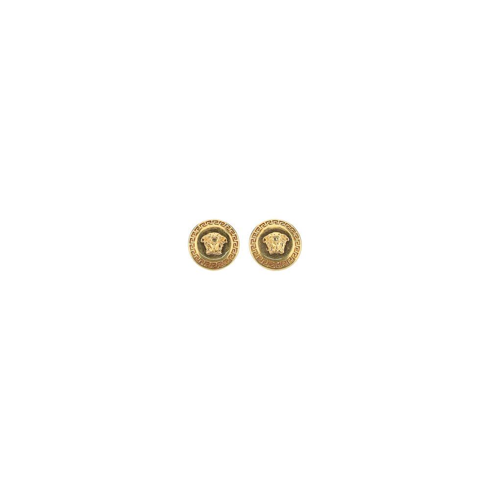 Gold Versace earrings with iconic embossed Medusa head design, elegant and luxurious fashion accessory.