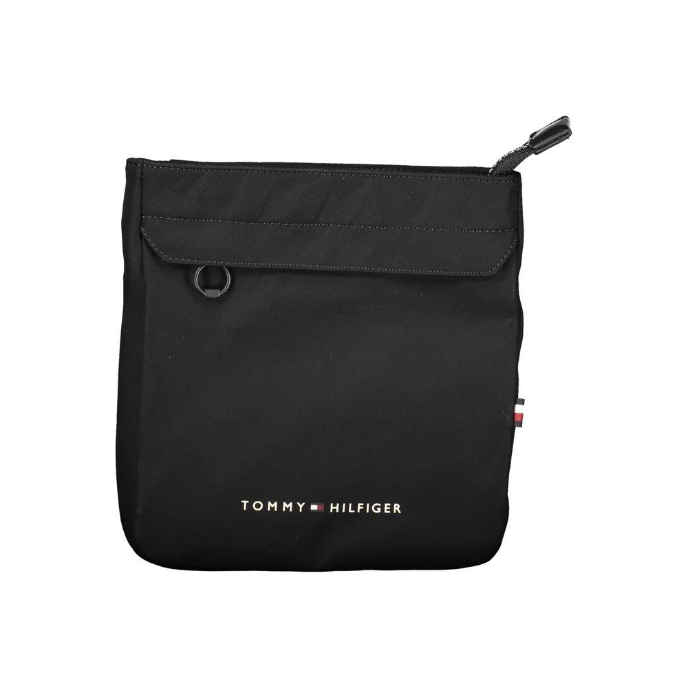 Tommy Hilfiger black men’s shoulder bag with zip closure and logo, made from recycled polyester, featuring adjustable strap for comfort.