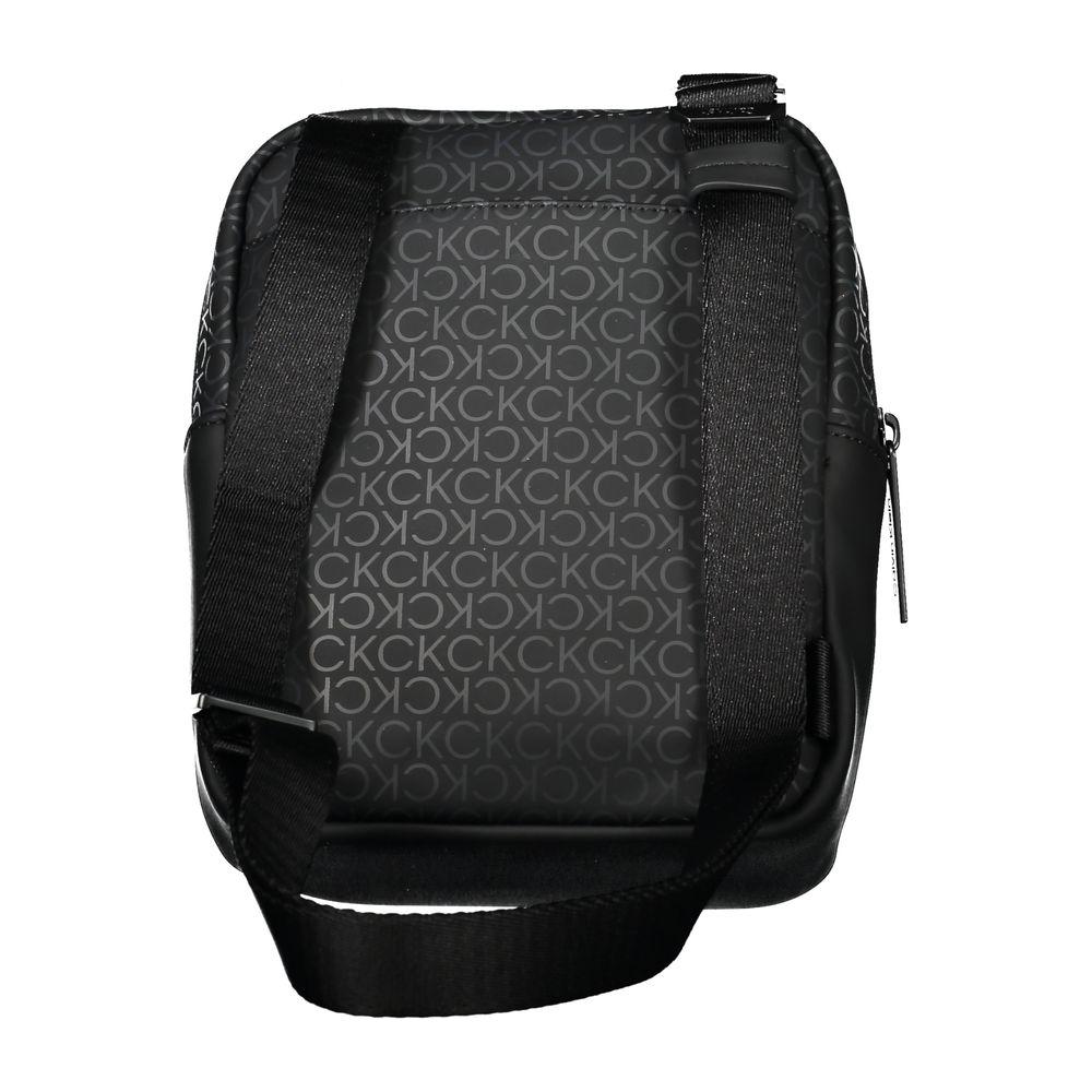 Calvin Klein black shoulder bag with CK monogram, adjustable strap, and contrasting accents for urban sophistication.