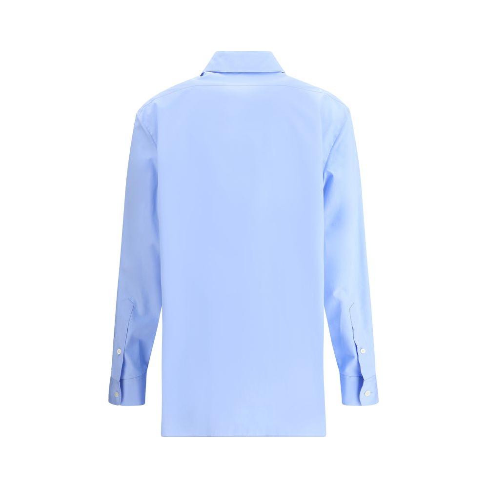 Back view of the blue Sisilia Cotton Shirt by The Row with classic collar and adjustable cuffs for minimal elegance.