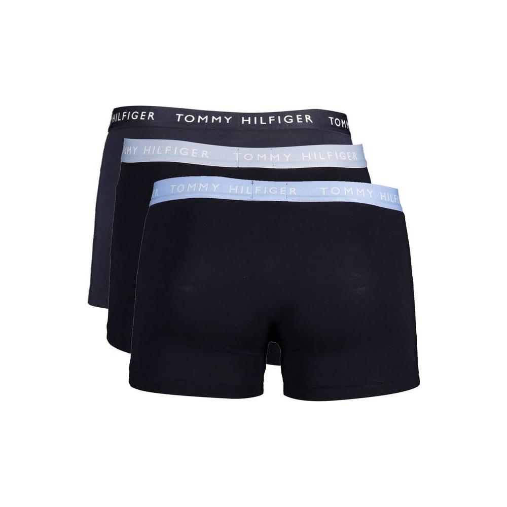 Tommy Hilfiger black cotton men's trunk tri-pack with elastic logo waistband, featuring soft, sustainable materials.