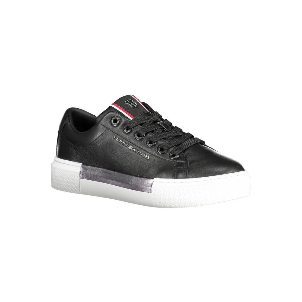 Tommy Hilfiger black leather women sneaker, stylish and versatile with durable leather, comfortable design, and modern details.
