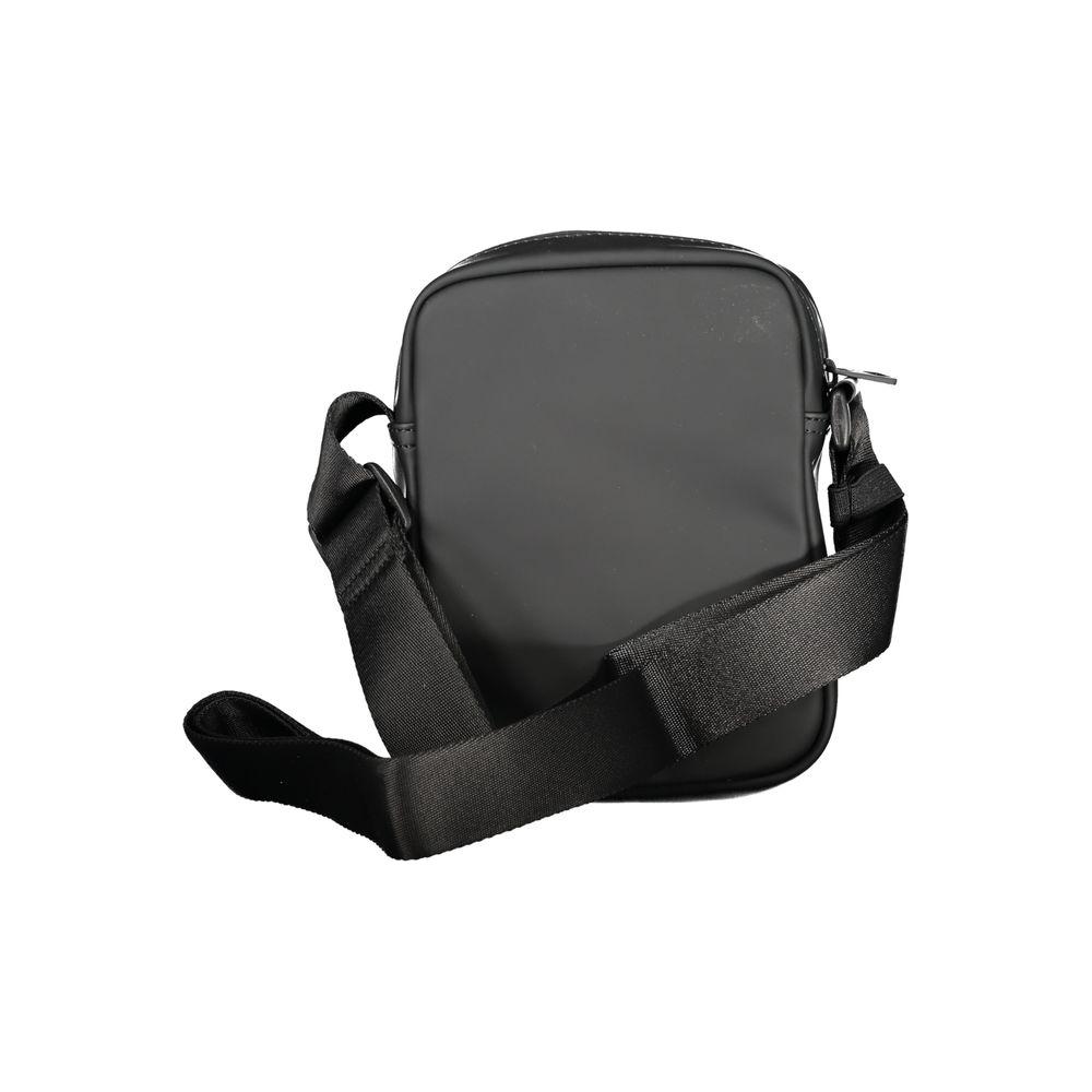 Tommy Hilfiger black shoulder bag with adjustable strap, external and internal pockets, zipper closure, logo design.