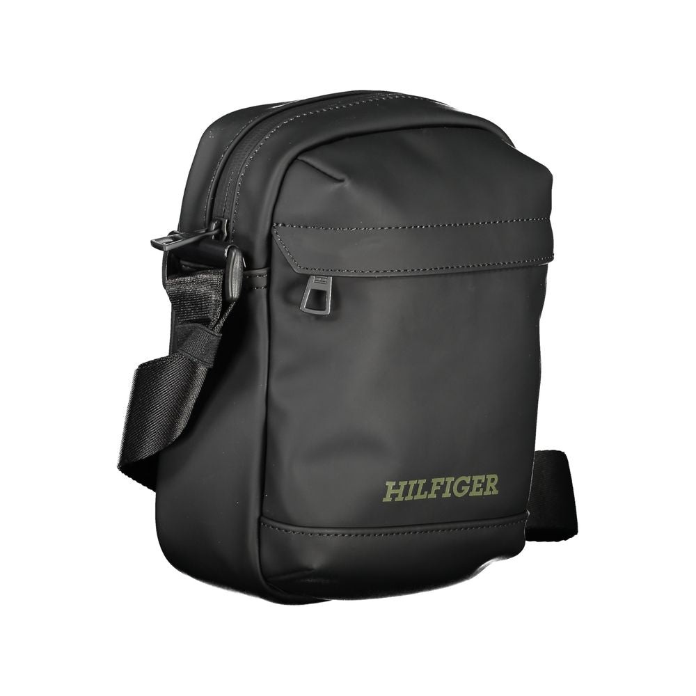 Tommy Hilfiger black polyethylene shoulder bag with adjustable strap, external and internal pockets, zip closure, and logo print.