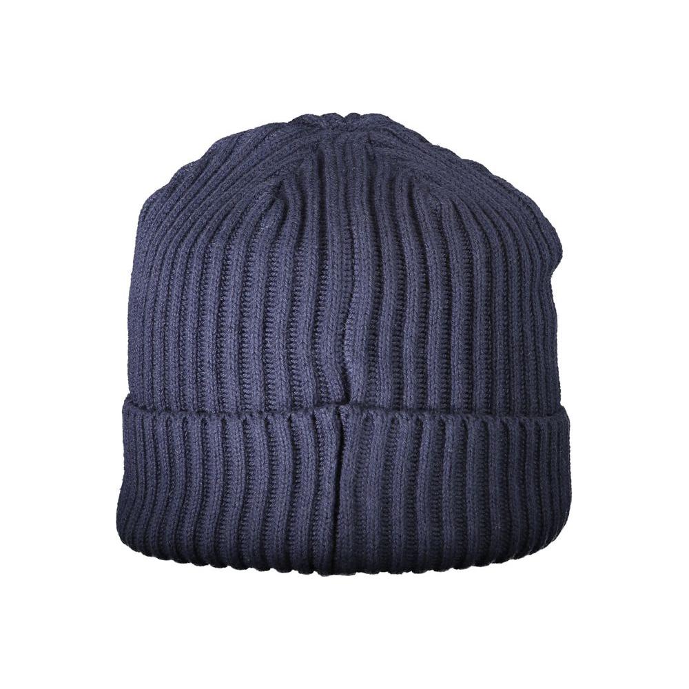 Navy blue ribbed knit beanie for men, offering warmth and style, perfect for winter fashion and outdoor activities.