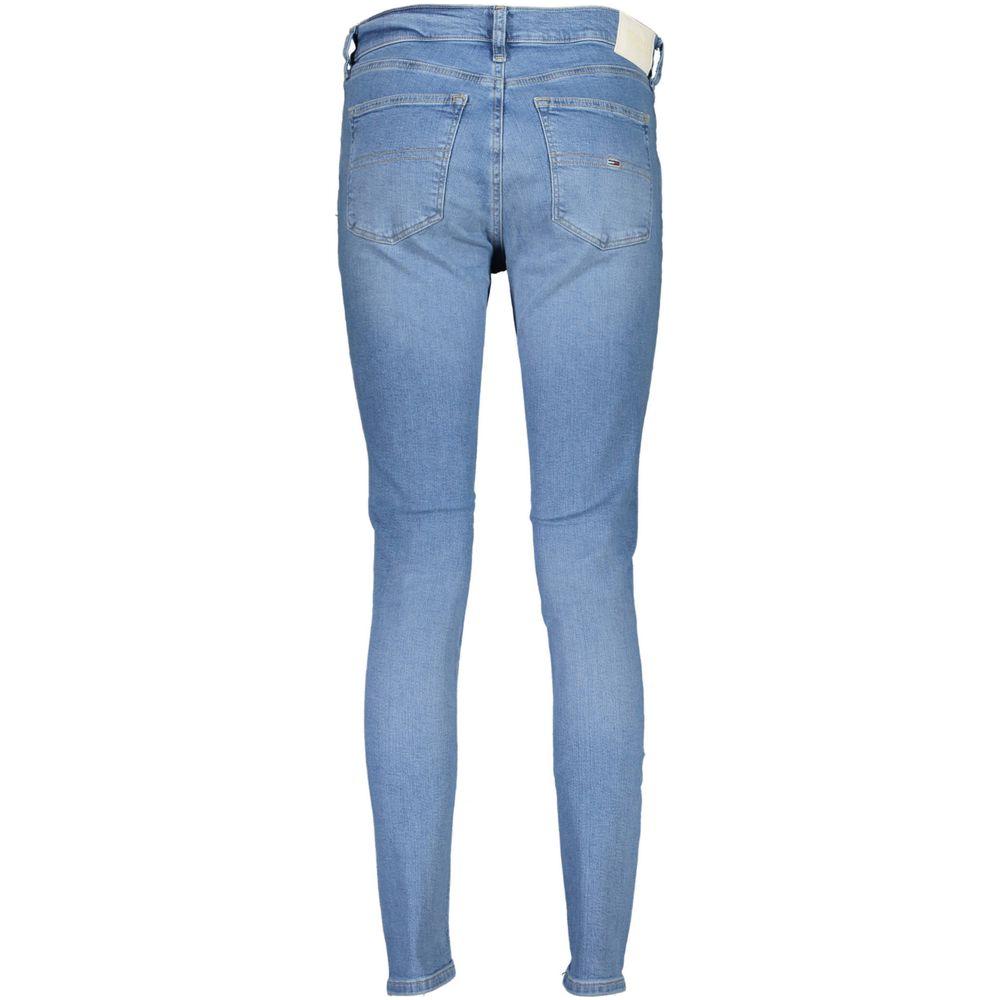 Back view of Tommy Hilfiger light blue skinny jeans for women, featuring mid-rise fit and signature logo detailing in cotton elastane blend.