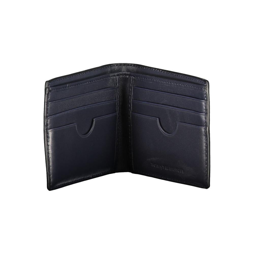 Tommy Hilfiger black leather wallet with double card spaces and contrast details, featuring brand logo.