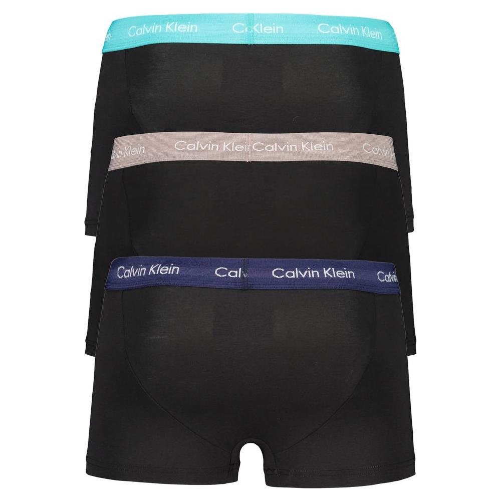 Calvin Klein black cotton boxer briefs tri-pack with elastic waistbands in assorted colors and logo detail.