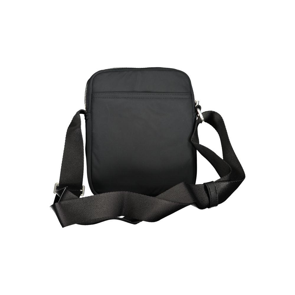 Tommy Hilfiger black recycled polyester shoulder bag with adjustable strap, zip closure, and multiple pockets for versatile use.