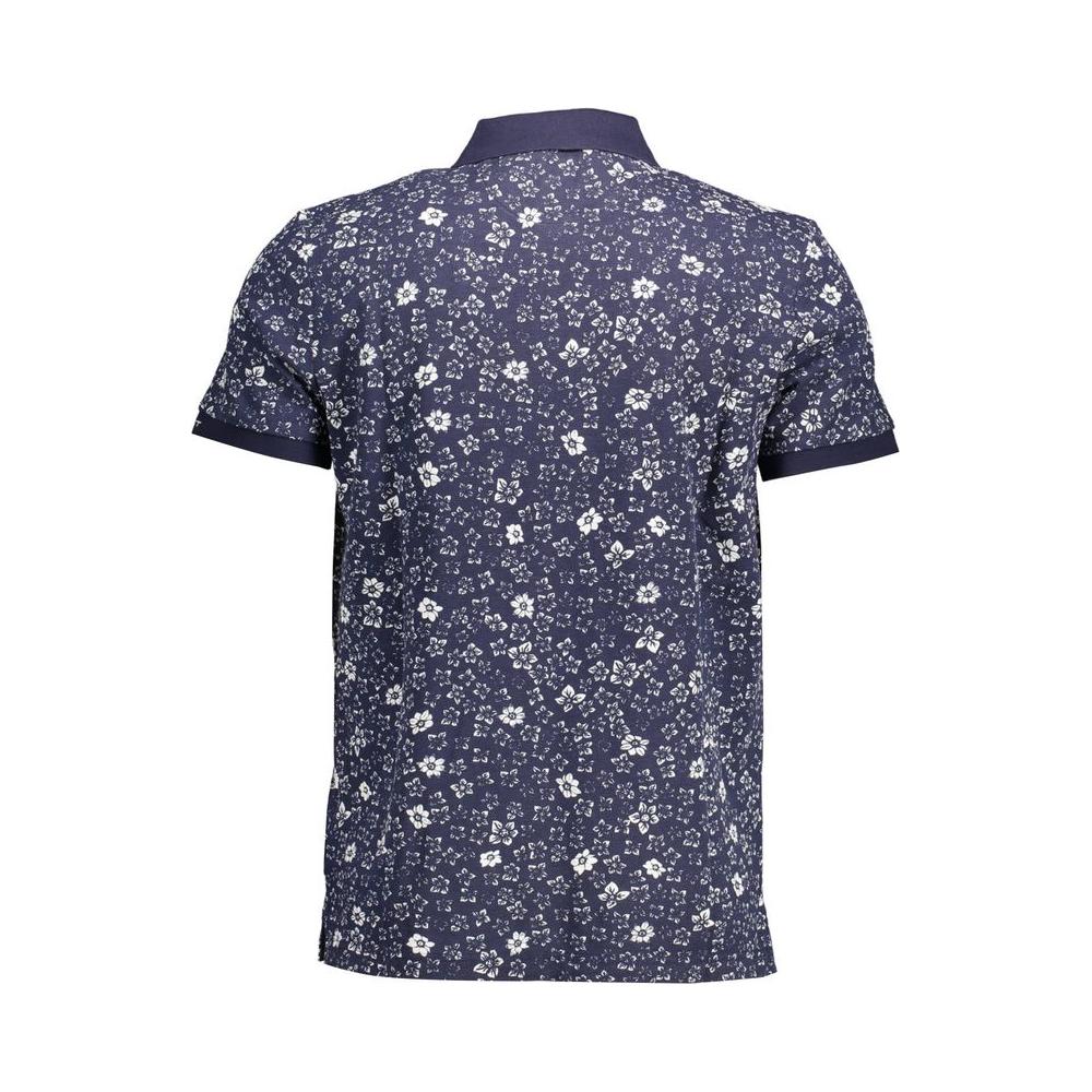 Back view of a blue floral-patterned men's polo shirt with short sleeves and a classic collar.