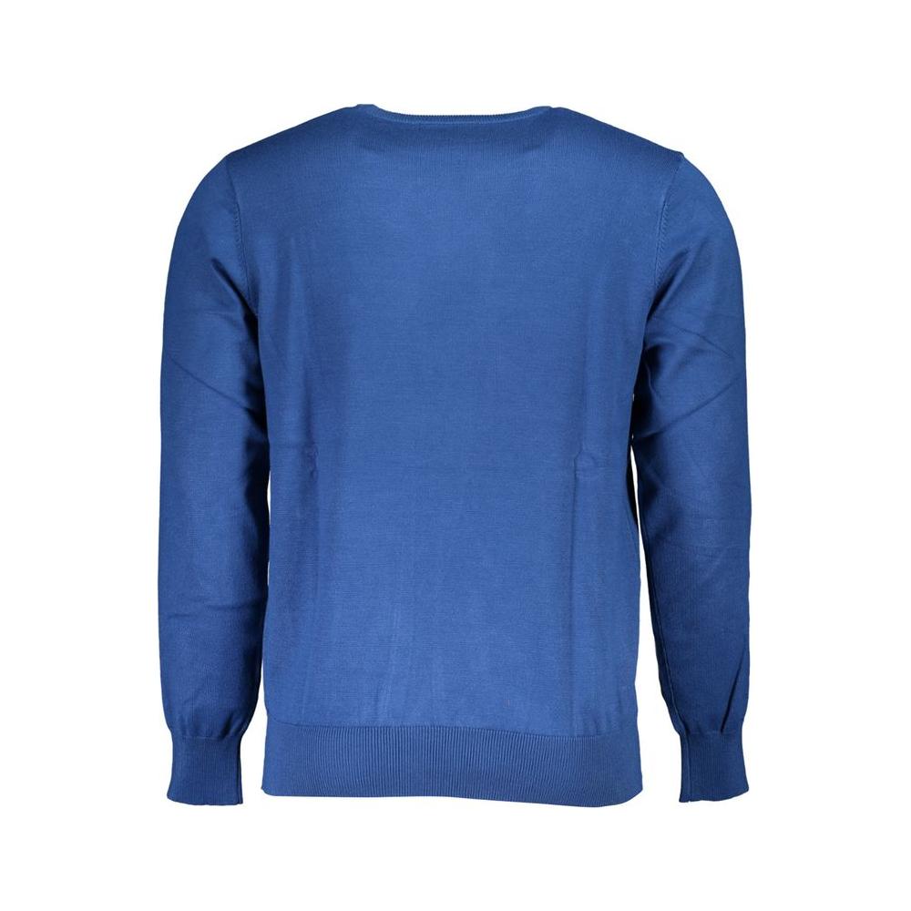 Back view of U.S. Grand Polo long-sleeved blue nylon sweater with crew neck and embroidered logo