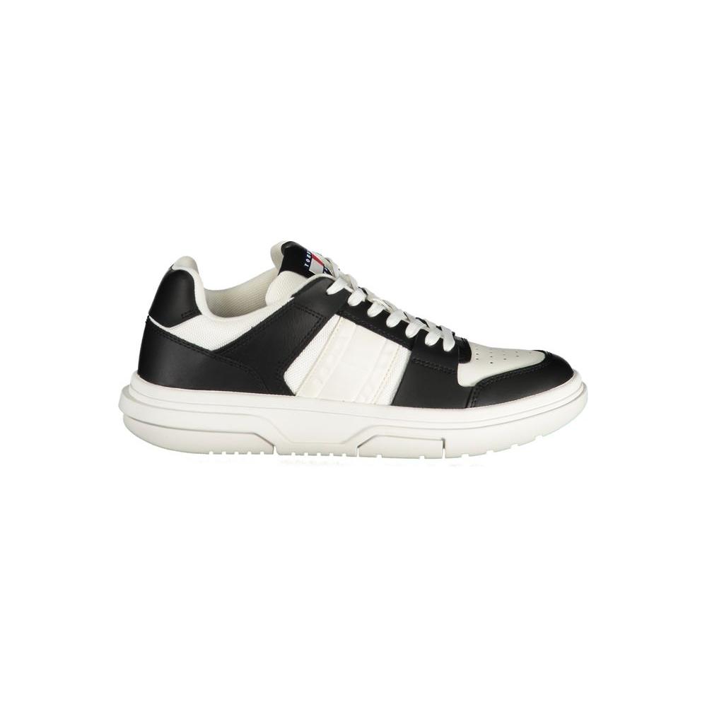 Tommy Hilfiger black leather women sneaker with white accents and logo, combining comfort and style for fashion-forward individuals.