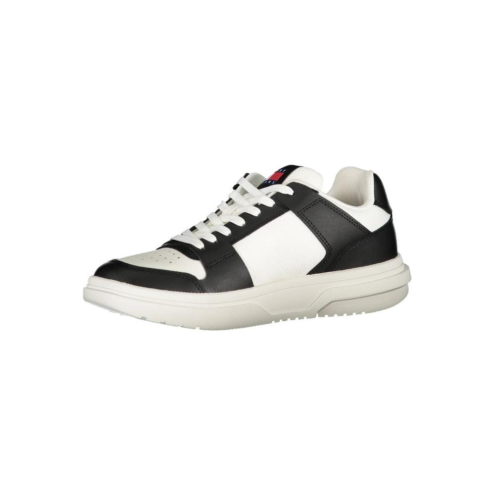 Tommy Hilfiger black leather women's sneaker with white accents, featuring logo and sleek design for stylish and comfortable wear.