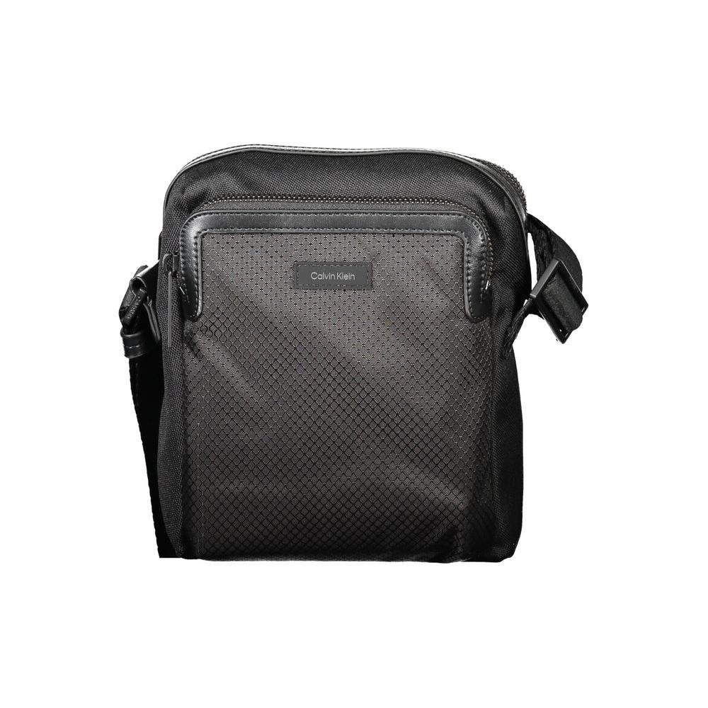 Calvin Klein black polyester men's shoulder bag with adjustable strap and zip closure, showcasing a sleek, minimalist design.