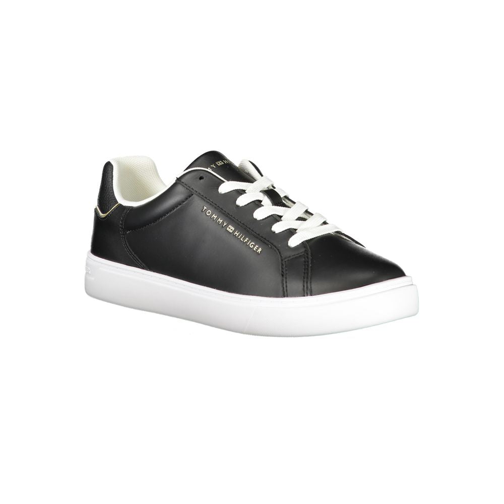 Tommy Hilfiger black leather women's sneaker with lace-up design and iconic logo, perfect for urban sophistication and fashion-forward style.