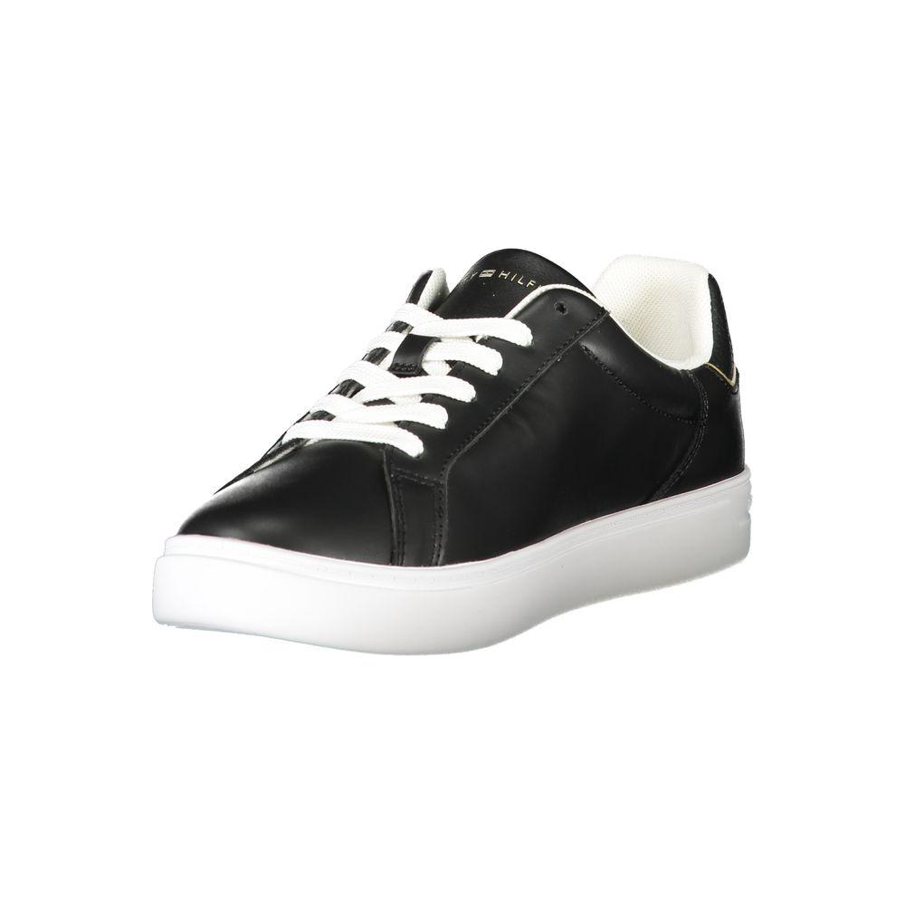 Tommy Hilfiger black leather women's sneaker with white laces, showcasing urban sophistication and casual chic design.
