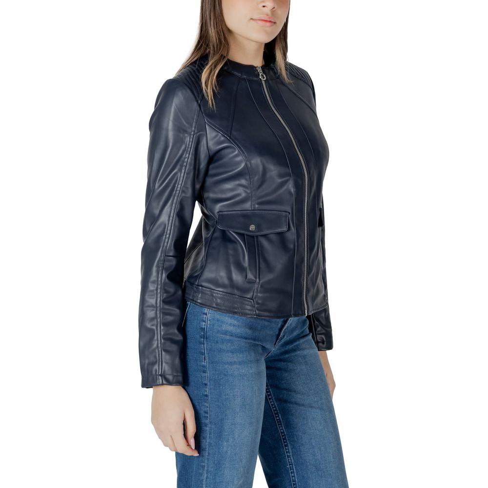 Woman wearing a Street One black polyester jacket, showcasing sleek design and modern fit, perfect for women's fashion collection.