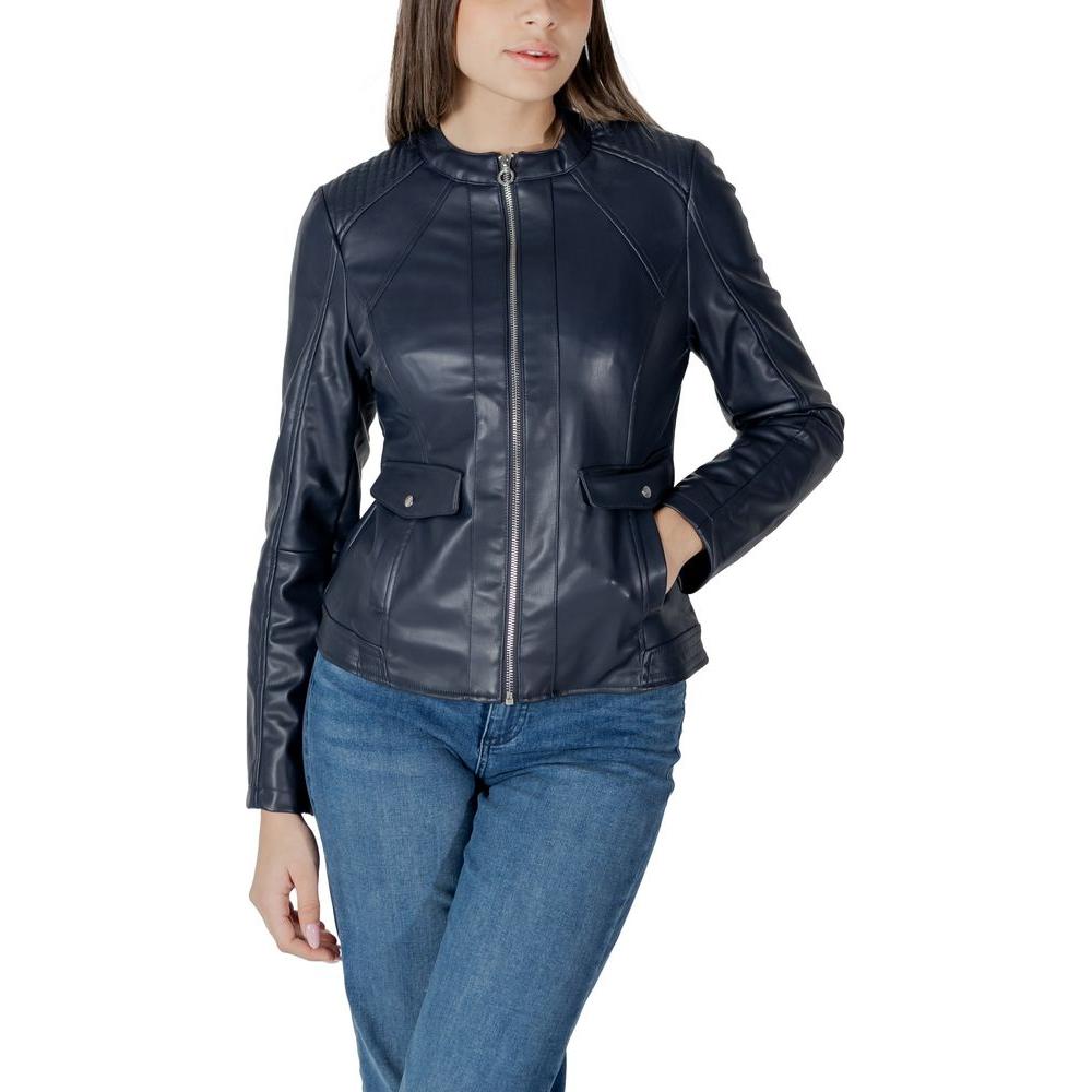 Woman wearing Street One black polyester jacket, front zipped, with long sleeves and pocket detailing, paired with blue jeans.