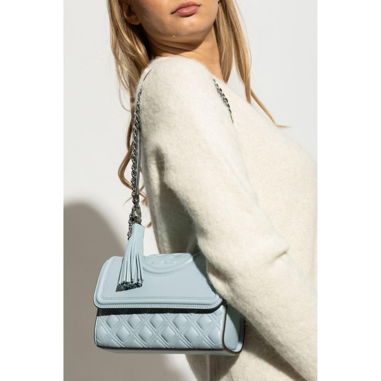 Front view with bag zipped and handles upright.