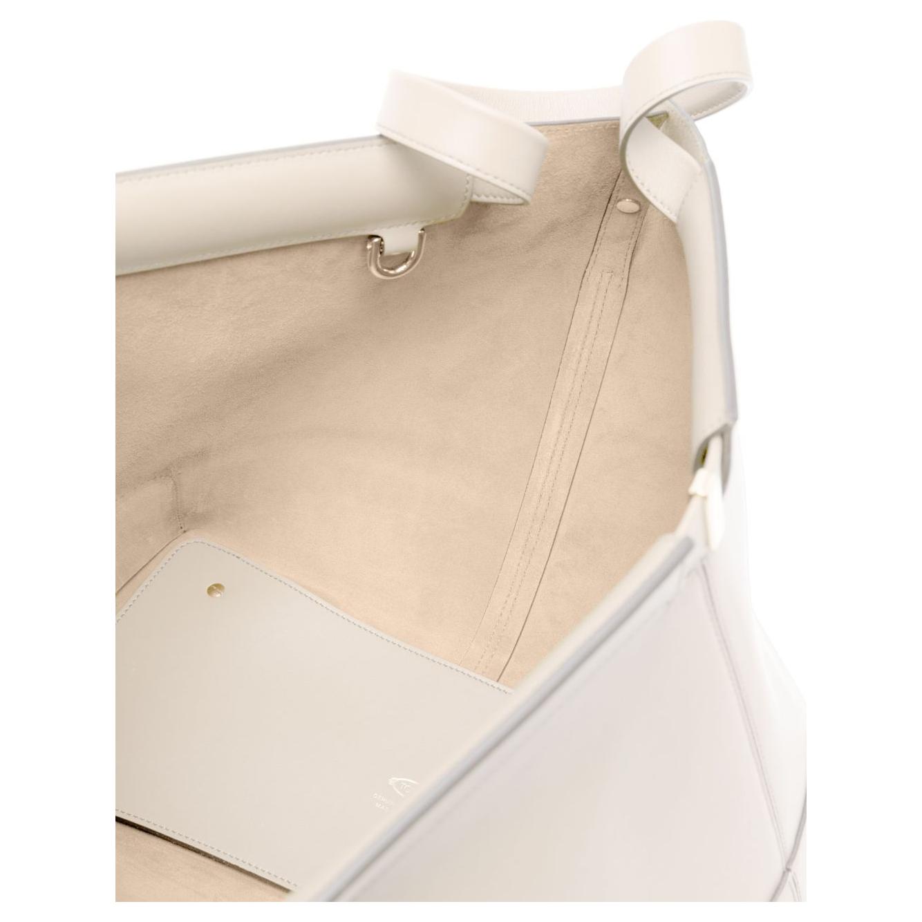 Front view with bag zipped and handles upright.