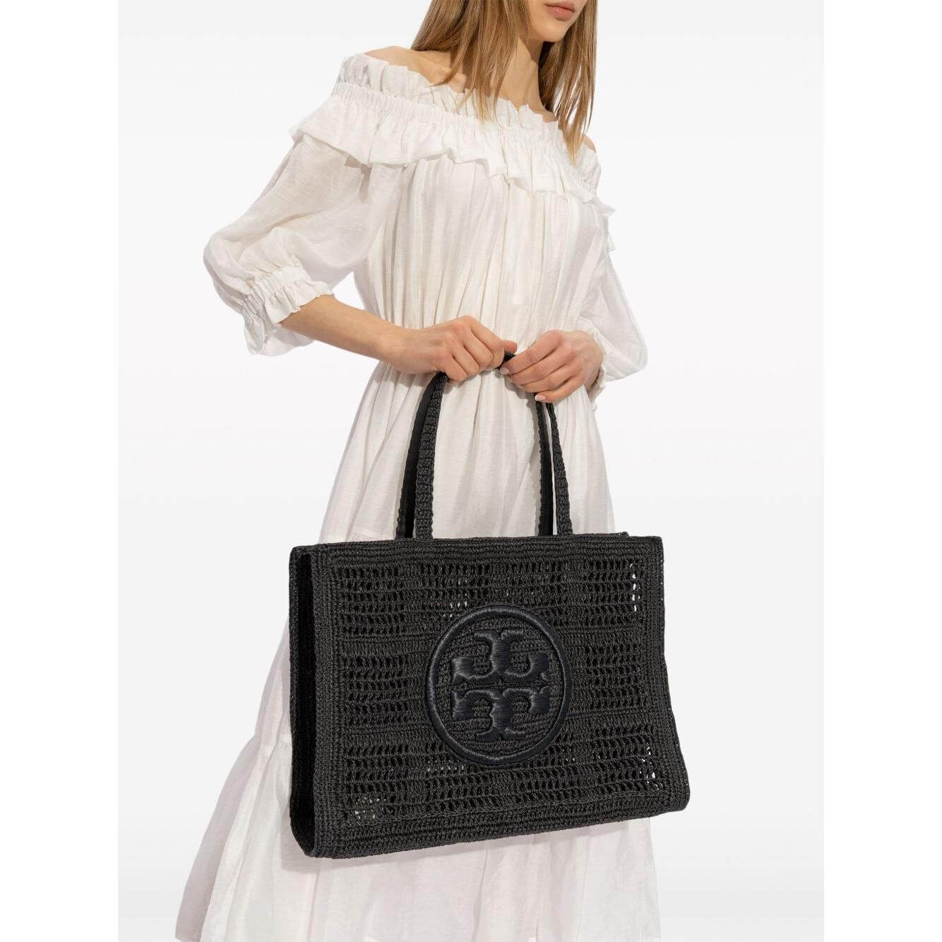Front view with bag zipped and handles upright.