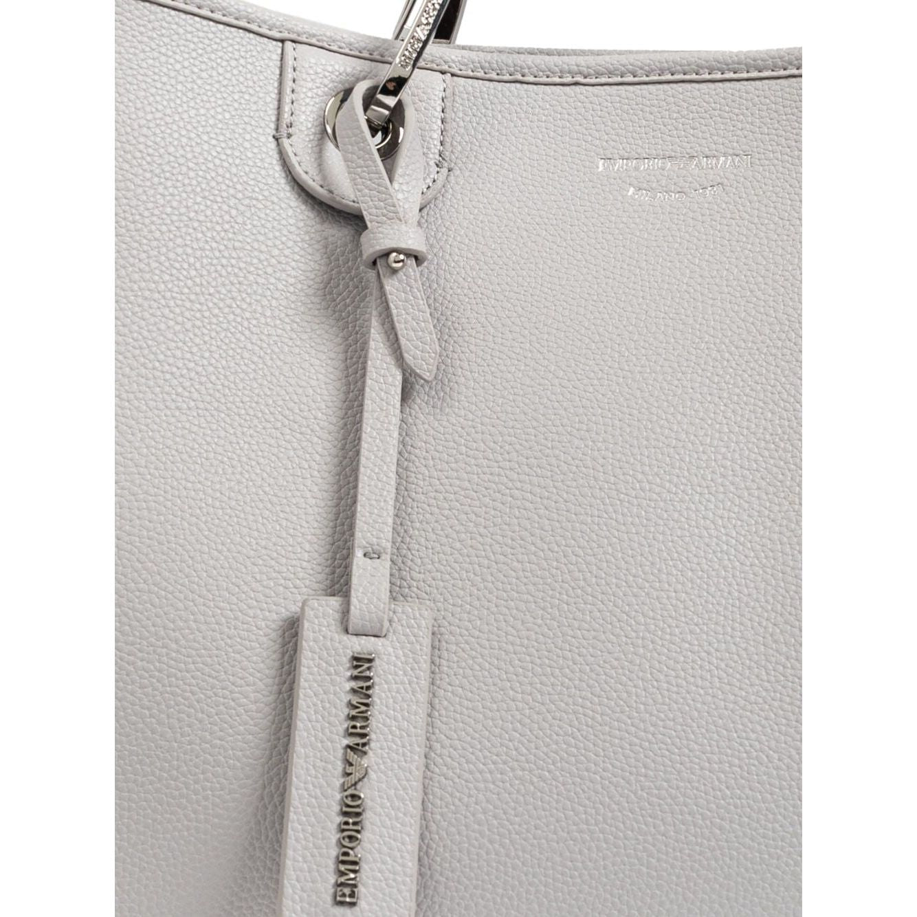 Front view with bag zipped and handles upright.