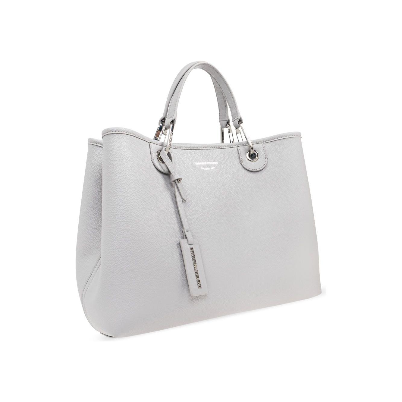 Front view with bag zipped and handles upright.