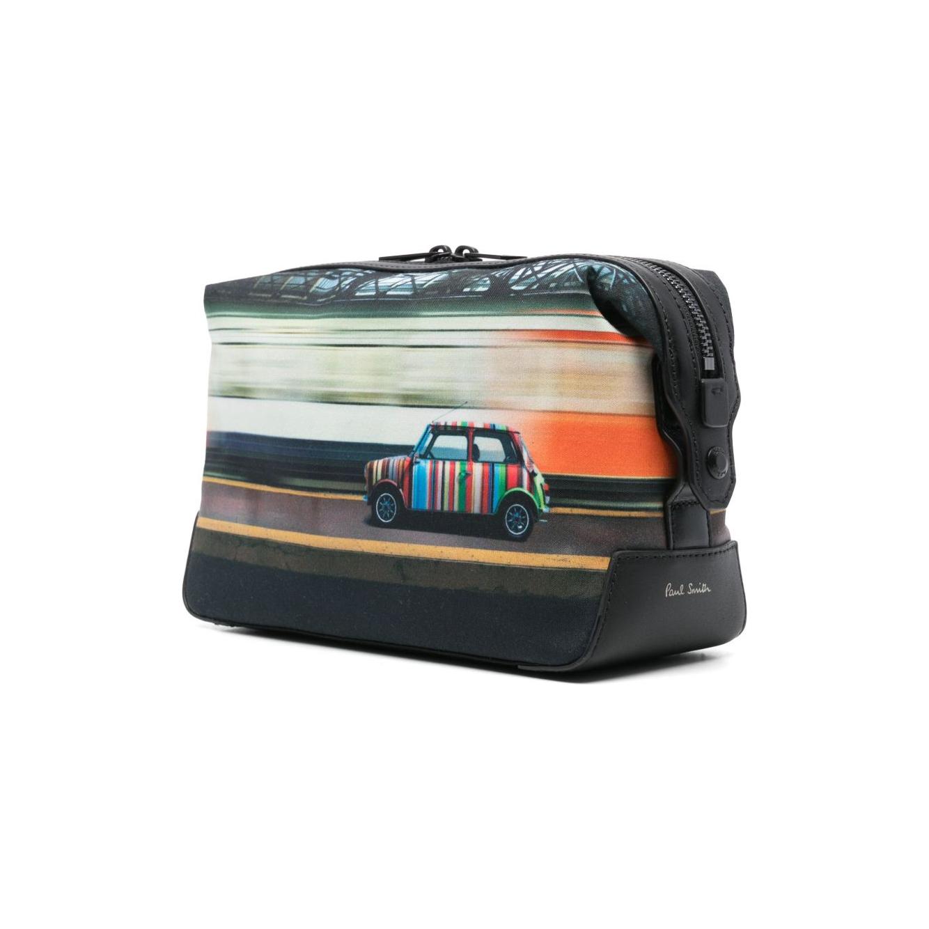 Front view with bag zipped and handles upright.