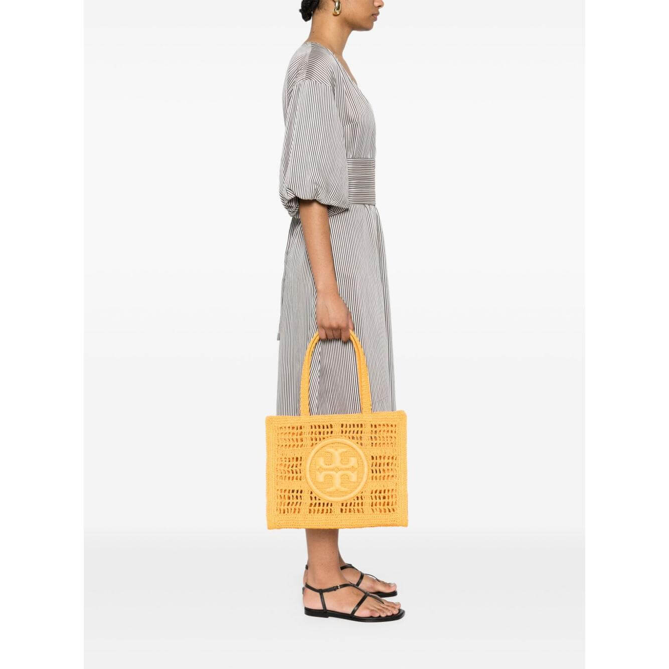 Front view with bag zipped and handles upright.