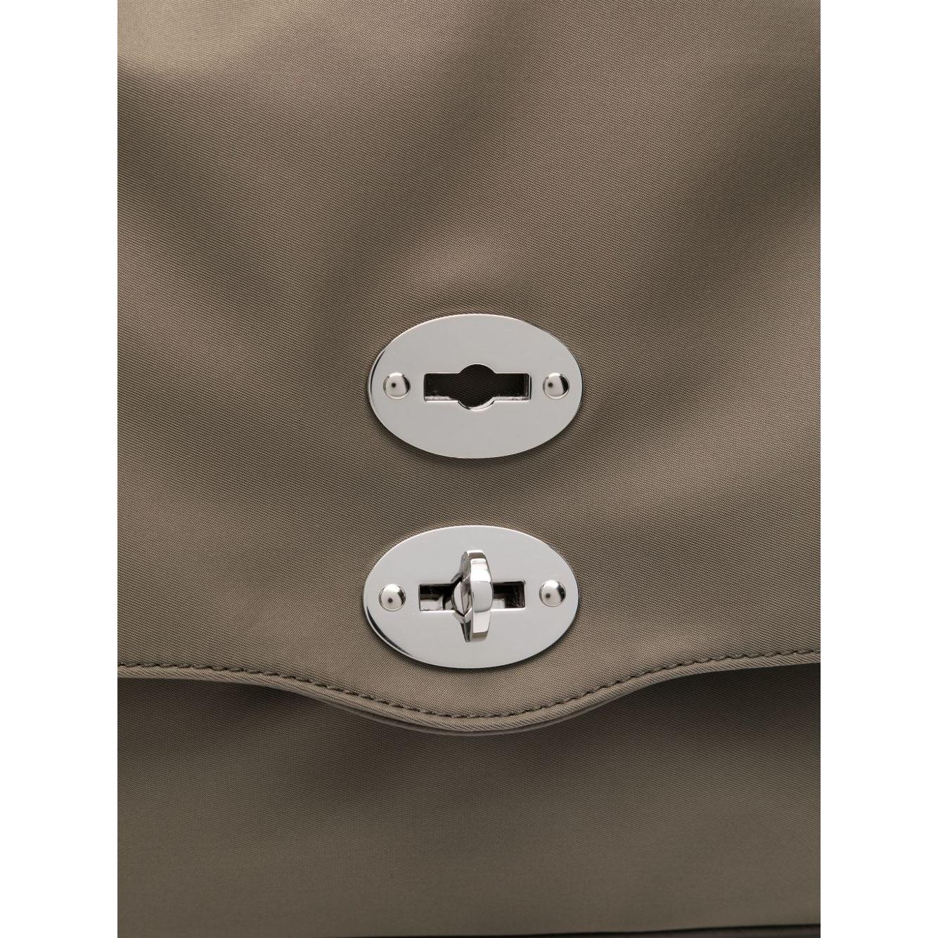Front view with bag zipped and handles upright.